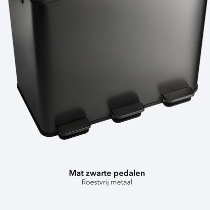Zwarte pedalen van een vuilnisbak met 3 vakken